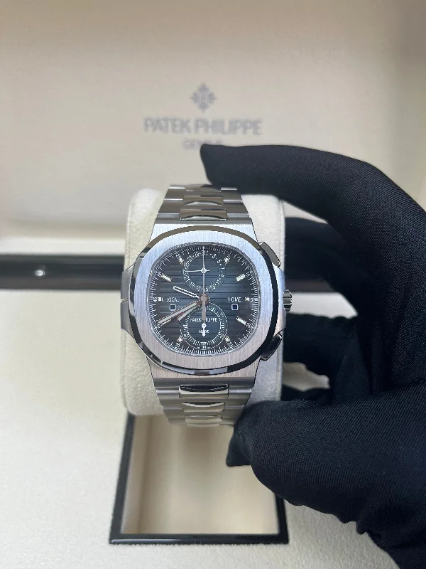 patek-philippe-nautilus-40-mm-steel-nautilus-travel-time-chronograph-blue-dial-5990