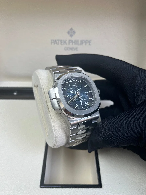 patek-philippe-nautilus-40-mm-steel-nautilus-travel-time-chronograph-blue-dial-5990