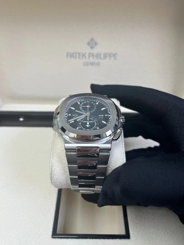 patek-philippe-nautilus-40-mm-steel-nautilus-travel-time-chronograph-blue-dial-5990