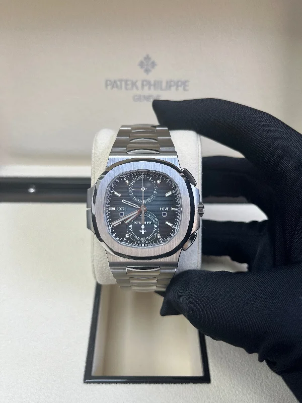 patek-philippe-nautilus-40-mm-steel-nautilus-travel-time-chronograph-blue-dial-5990