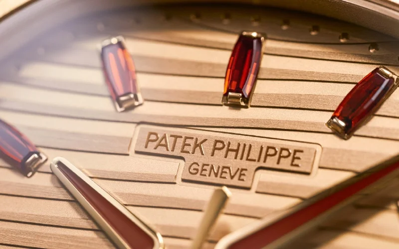 patek-philippe-nautilus-automatic-rose-gold-baguette-cognac-bezel-7118-1300r-001