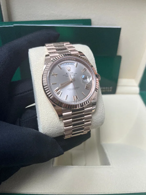 rolex-day-date-40-rose-gold-sundust-roman-dial-fluted-bezel-ref-228235