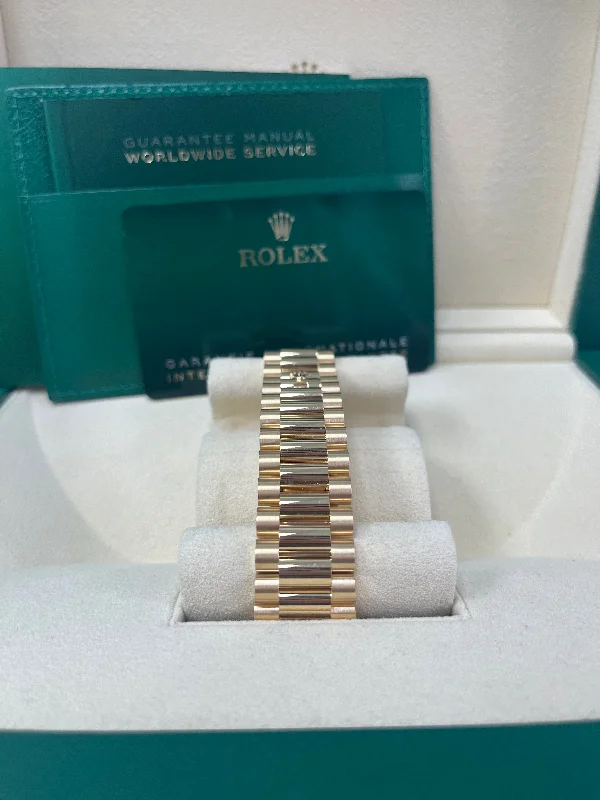 rolex-day-date-40-yellow-gold-champagne-roman-dial-fluted-bezel-ref-228238