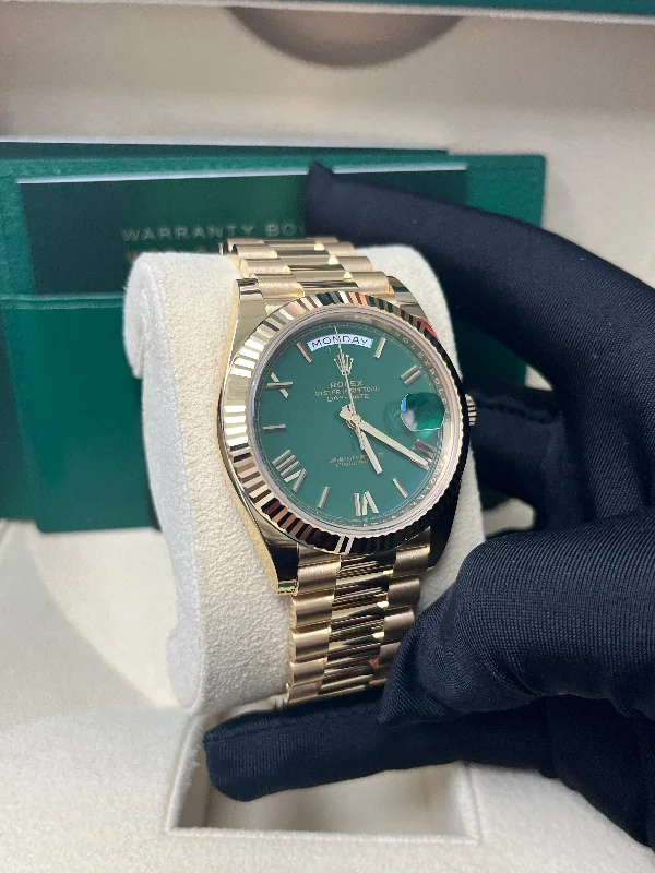 rolex-day-date-40-yellow-gold-day-date-40mm-reference-228238-green-roman-dial-new-2022-release