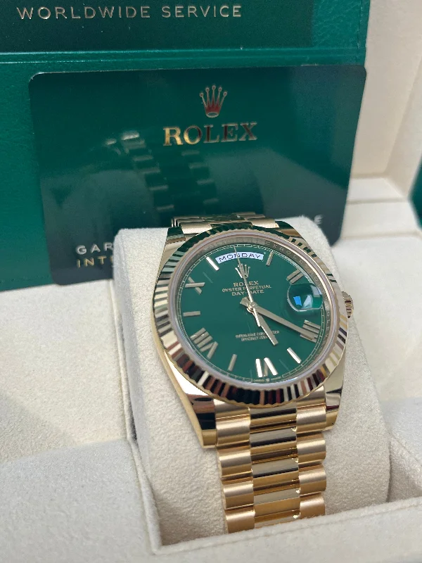 rolex-day-date-40-yellow-gold-day-date-40mm-reference-228238-green-roman-dial-new-2022-release