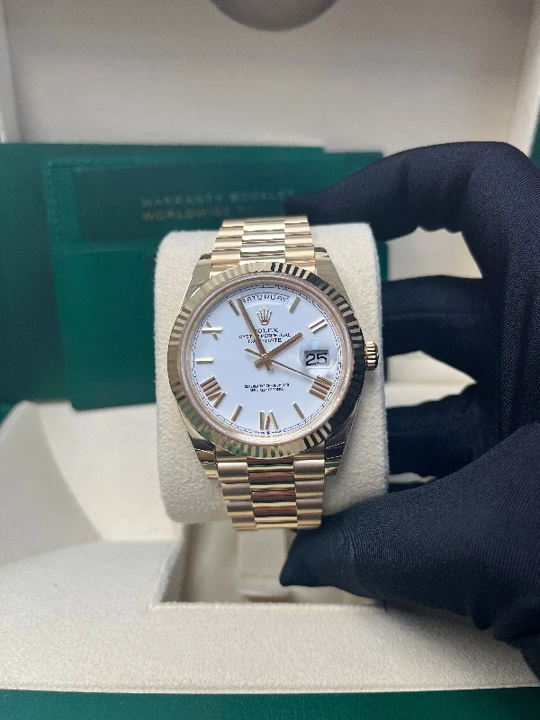 rolex-day-date-40-yellow-gold-white-roman-dial-fluted-bezel-ref-228238