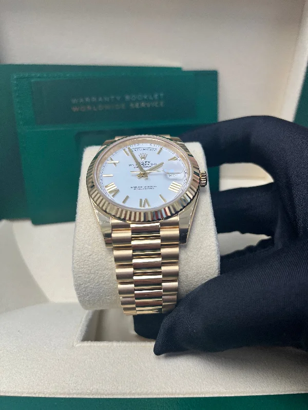 rolex-day-date-40-yellow-gold-white-roman-dial-fluted-bezel-ref-228238