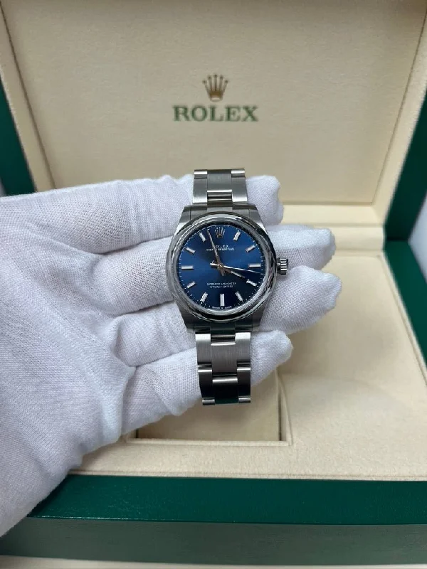 rolex-oyster-perpetual-31-domed-bezel-blue-index-dial-oyster-bracelet-ref-277200