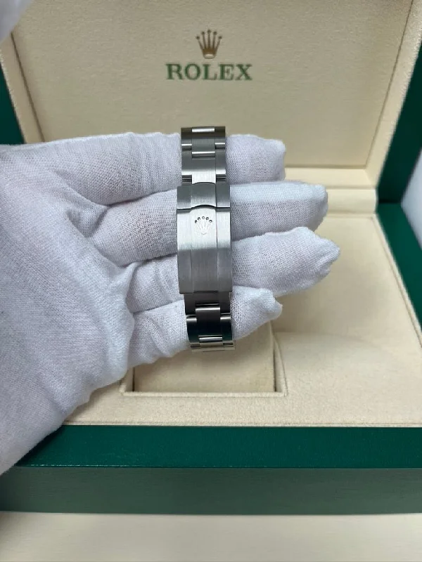 rolex-oyster-perpetual-31-domed-bezel-blue-index-dial-oyster-bracelet-ref-277200