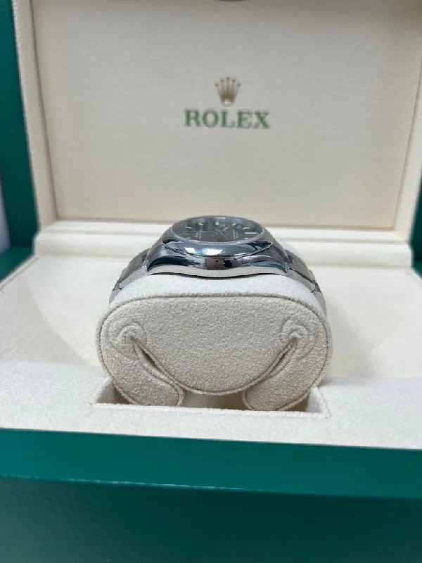 rolex-oyster-perpetual-31-domed-bezel-blue-index-dial-oyster-bracelet-ref-277200