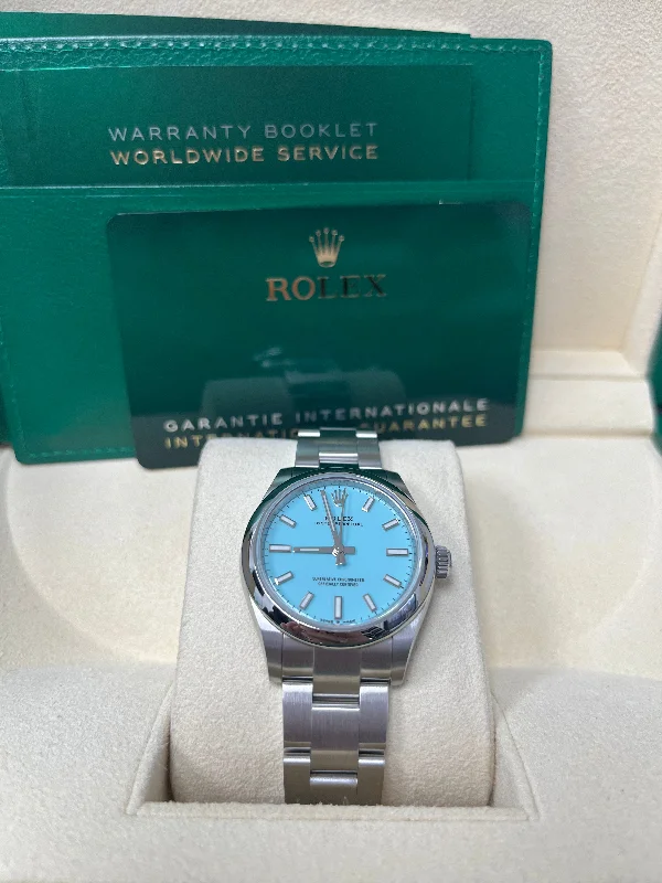 rolex-oyster-perpetual-31-domed-bezel-turquoise-blue-index-dial-oyster-bracelet-277200