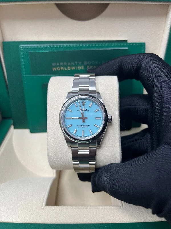 rolex-oyster-perpetual-31-domed-bezel-turquoise-blue-index-dial-oyster-bracelet-277200