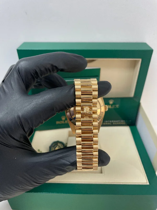 rolex-yellow-gold-day-date-40-watch-yellow-gold-bezel-champagne-index-dial-president-bracelet-ref-228348rbr